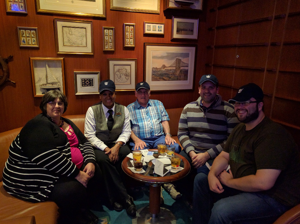My mum, a Royal Caribbean waitress, dad, myself, and Lee.