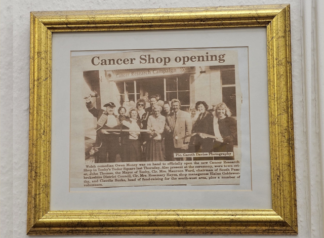 A newspaper clipping of the Tenby Cancer Research Campaign charity shop opening in March 1992.